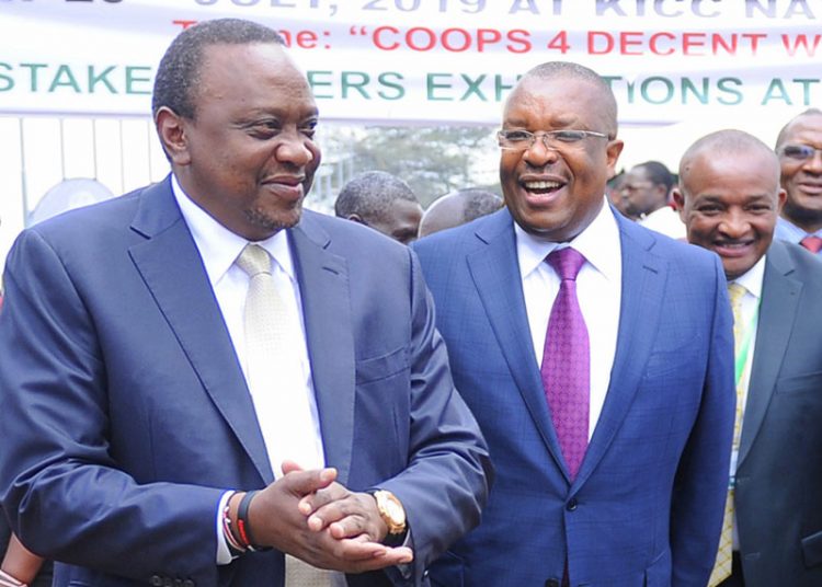 President Uhuru Kenyatta is received at this year’s Ushirika Day Celebrations by Co-op Bank the Group MD and CEO Dr. Gideon Muriuki. The bank has expanded its branch network.