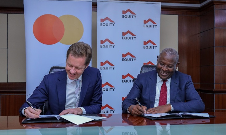 Mark Elliott, Division President for Sub Saharan Africa at Mastercard and Dr. James Mwangi, Equity Group Managing Director and CEO  sign a 10-year partnership agreement that will deliver innovative solutions for various customer segments including e-commerce payments, cross border payments, community pass for farmers and small businesses, QR and tap on phone.[Photo/Courtesy]
