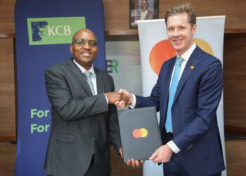 KCB Group Chief Executive Officer (CEO) Paul Russo and Divison President and Country Manager for East Africa at Mastercard Mark Elliott [Photo/ KCB Group]